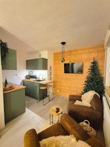 Appartements Le Repaire de la Marmotte : photos des chambres