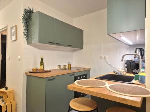 Appartements Le Repaire de la Marmotte : photos des chambres