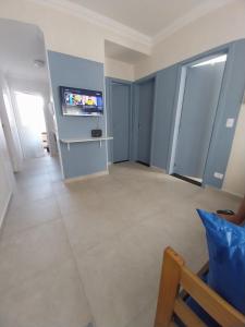 Casa em condomínio no Centro de Bertioga com Ar condicionado