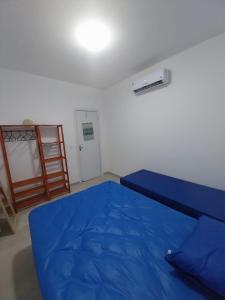 Casa em condomínio no Centro de Bertioga com Ar condicionado