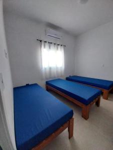 Casa em condomínio no Centro de Bertioga com Ar condicionado