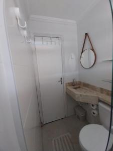 Casa em condomínio no Centro de Bertioga com Ar condicionado