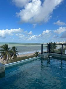 Prédio Pé na Areia Breeze 109 - com Área Externa Privativa - Algodão Flats