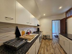 Appartements La Maison des Ecureuils : photos des chambres