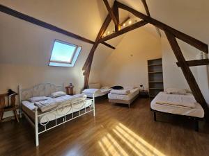 Appartements La Maison des Ecureuils : photos des chambres
