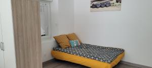 Appartements Les orangers : photos des chambres
