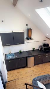 Appartements Le Loft, T2 duplex centre ville historique : photos des chambres