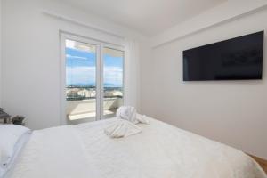 Apartments with parking space Makarska - 23931
