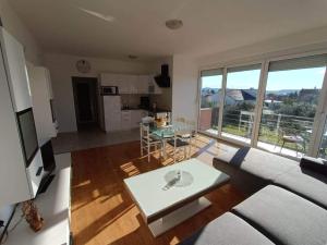 Family-friendly apartments with swimming pool Sukosan, Zadar - 23934