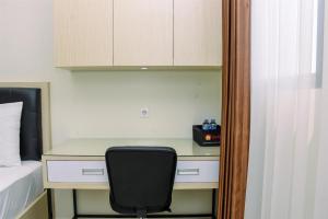 Elegant and Nice Studio at Evenciio Margonda Apartment By Travelio