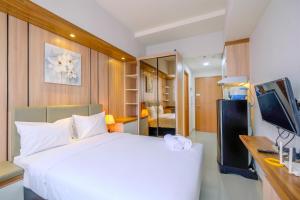 Good Deal Studio at Evenciio Apartment Margonda near UI By Travelio