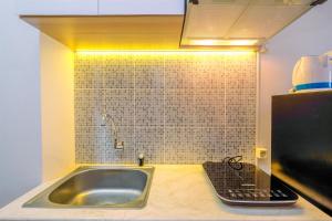 Good Deal Studio at Evenciio Apartment Margonda near UI By Travelio
