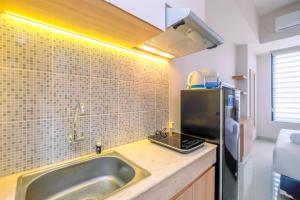 Good Deal Studio at Evenciio Apartment Margonda near UI By Travelio