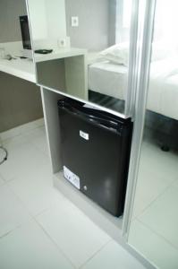 Nice Studio Apartment at Aeropolis Residence near CGK Airport By Travelio