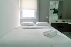 Nice Studio Apartment at Aeropolis Residence near CGK Airport By Travelio