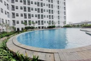Nice and Comfort Studio at Serpong Garden Apartment By Travelio