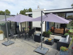 Breskens Chalet Lampenfieber Breskens mit Zaun Hausnr A027