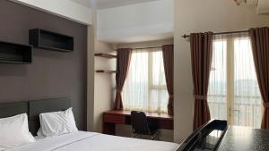 Comfort and Homey Studio at Margonda Residence 5 Apartment By Travelio