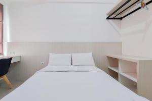 Comfy Studio at Poris 88 Apartment By Travelio