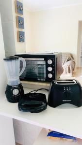 Um refugio tranquilo e famíliar , 100m da praia