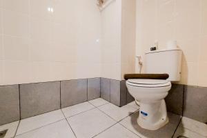 Homey and Cozy Studio Akasa Pure Living BSD Apartment By Travelio