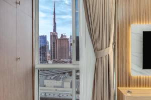 Modern 1 Bedroom apartment - Burj Khalifa Views in Mayfair Tower in Business Bay - 4hvězdičkové hotely ve městě Dubaj