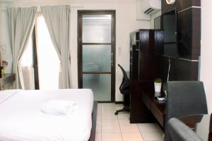 Luxury Studio at Metropark Condominium Jababeka Apartment By Travelio