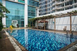 Comfort and Modern Look Studio Apartment at Ambassade Kuningan By Travelio