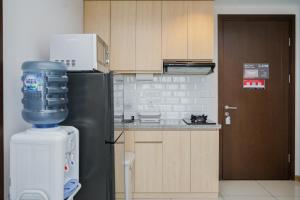 Comfortable and Nice 1BR at M-Town Signature Apartment By Travelio