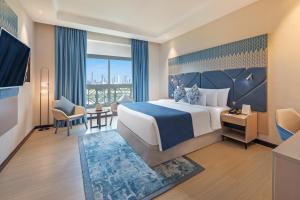 Deluxe Room, 20% F&B, with Complimentary Shuttle to Dubai Mall & La Mer Beach room in Occidental Al Jaddaf