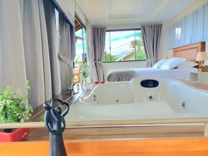 Recanto Pôr do Sol com banheira e lareira