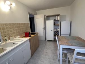 Appartements Appartment Jumapi : photos des chambres