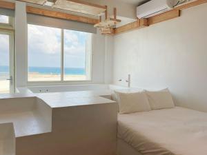 Phòng 4 Người Nhìn Ra Biển (Quadruple Room with Sea View)