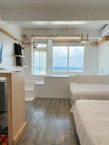 Phòng 4 Người Nhìn Ra Biển (Quadruple Room with Sea View)