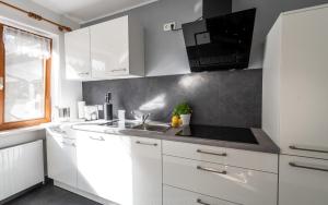Neu! Sonnige Terrassen-Ferienwohnung in den Bergen