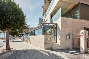 Beachfront apartment with private Taberna - By Welcomely