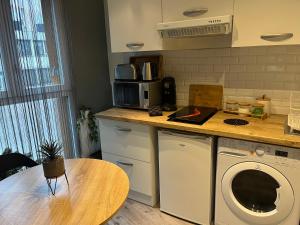 Appartements Charment studio : photos des chambres