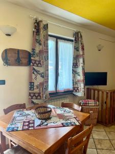 BAITA ARIANNA Trilocale SISES