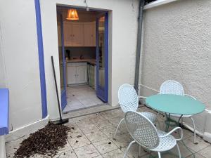 Maisons de vacances Charmante maisonnette : photos des chambres