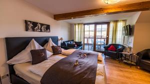 Gästehaus Holzer Kreuz - Ferienwohnung "Narzisse"