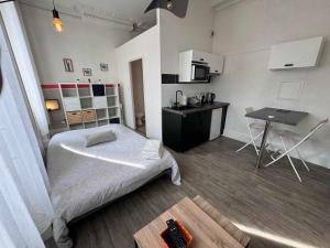 Appartements Studio Pont-Canal : photos des chambres