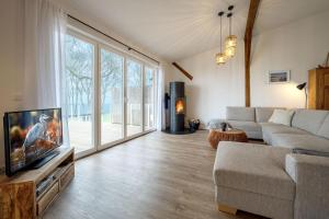 Westscheune am Mühlendamm - Meerblick, Sauna und Ofen