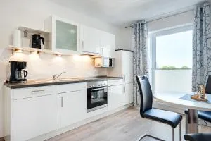 Ferienwohnung Flut mit Loggia und schönem Ausblick am Badesee Tannenhausen - Aurich