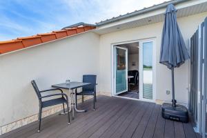 Ferienwohnung Flut mit Loggia und schönem Ausblick am Badesee Tannenhausen