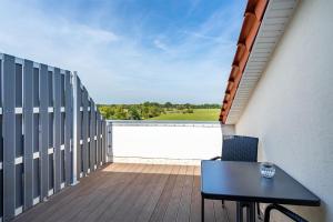 Ferienwohnung Flut mit Loggia und schönem Ausblick am Badesee Tannenhausen