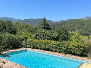 Villas Stylish villa with large pool and stunning views : photos des chambres
