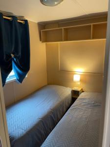 Campings 600m de la plage - Mobilhome Loka 4 personnes camping Goelands 3 etoiles : photos des chambres