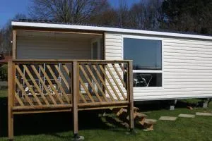 Mobilheim Herzmuschel mit Veranda am Kransburger See 554 - Midlum