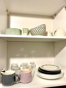 Appartements Cozy and warm apartment : photos des chambres