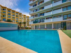 Apartment with communal pool access